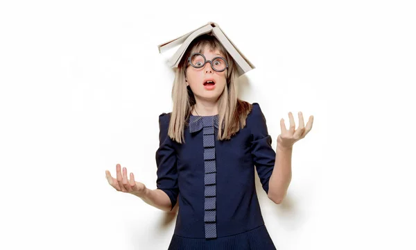 Portrait of a nerd girl in glasses with books — Stock Photo, Image