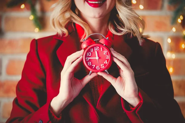 Portrait Young Girl Red Coat Alarm Clock Christmas Lights Background — Stock Photo, Image