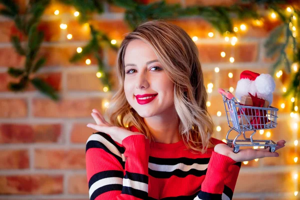 Portrait Young Girl Red Striped Sweater Gifts Cart Christmas Lights — Stock Photo, Image