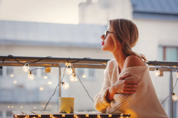 Young Woman Cup Coffee Sitting Table Fairy Lights Evening Time — Stock Photo, Image