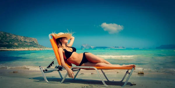 Young Redhead Girl Black Bikini Hat Lying Lounger Balos Beach — Stock Photo, Image