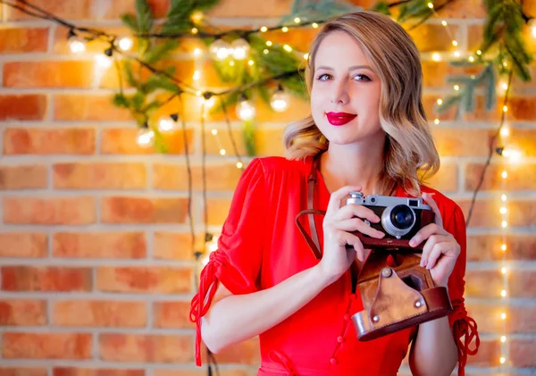 Portrait Young Cozy Woman Red Dress Vintage Camera Christmas Lights — Stock Photo, Image