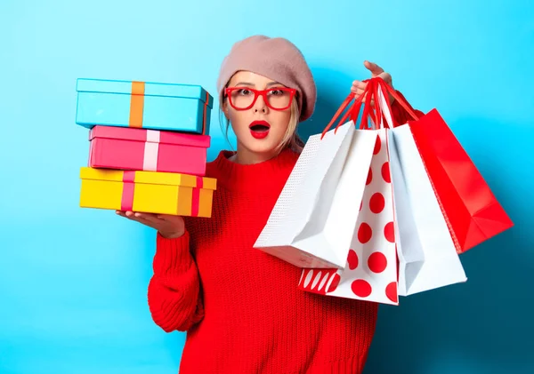 Portrait Young Girl Red Sweater Gift Box Shopping Bags Blue — Stock Photo, Image