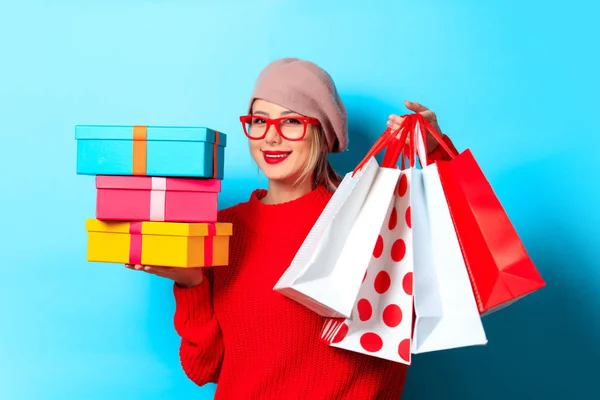 Portrait Young Girl Red Sweater Gift Box Shopping Bags Blue — Stock Photo, Image