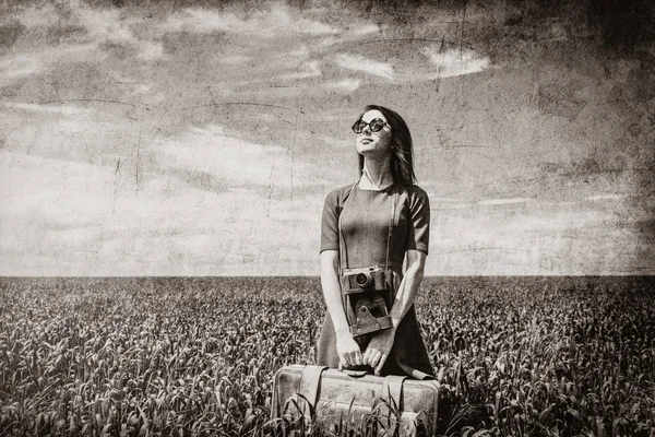 Young woman with suitcase — Stock Photo, Image