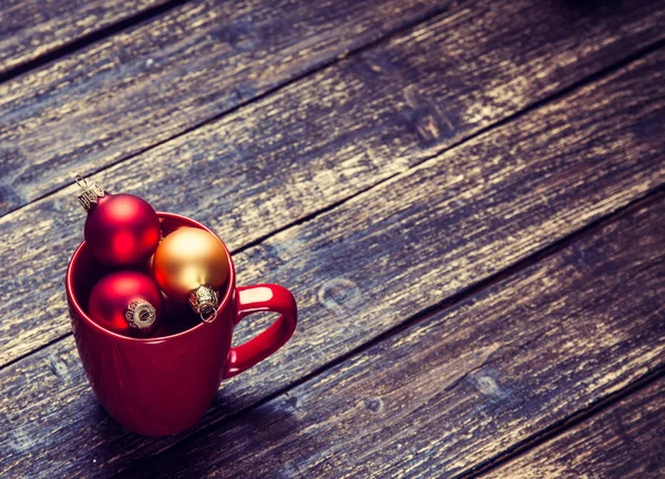 Red Cup Christmas Baubles Wooden Table — Stock Photo, Image