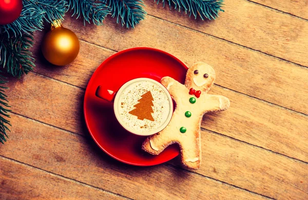 Cappuccino with gingerbread man — Stock Photo, Image