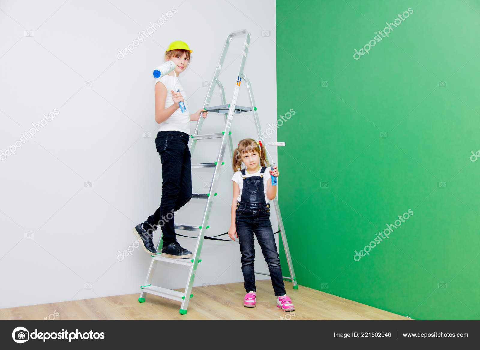 Little Girls Painting Room Green Color Stock Photo