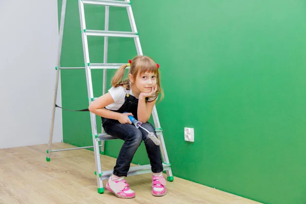 Little Girl Holding Roller Sitting Ladder Concept Repair Apartment — Stock Photo, Image