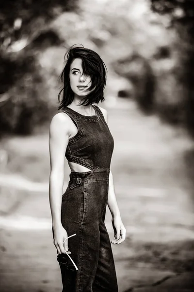 Young woman on the road — Stock Photo, Image