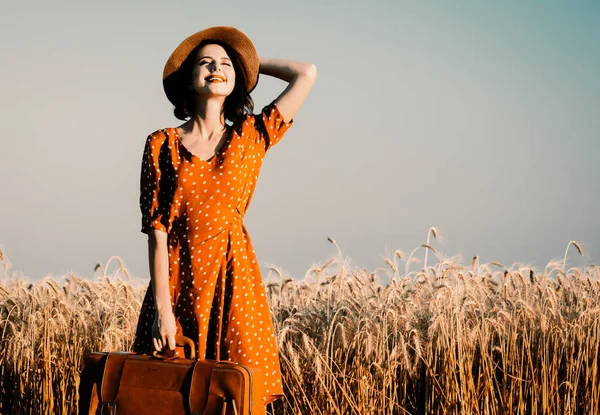 Young woman with suitcase — Stock Photo, Image