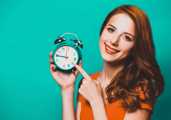 Redhead Girl Alarm Clock Blue Background — Stock Photo, Image