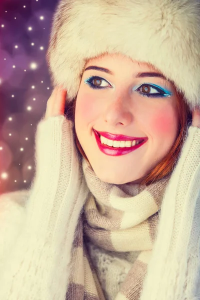 Redhead girl with makeup in fur hat and white scarf — Stock Photo, Image