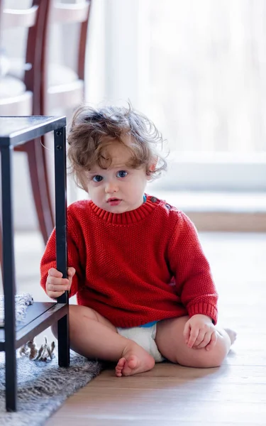 Little toddler boy on a floor at home — Stock Photo, Image