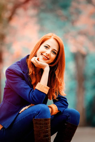 Style redhead girl with suitcase — Stock Photo, Image