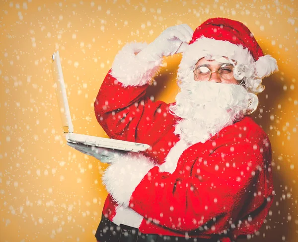 Funny Santa Claus have a fun with laptop — Stock Photo, Image