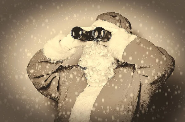 Funny Santa Claus have a fun with binoculars — Stock Photo, Image