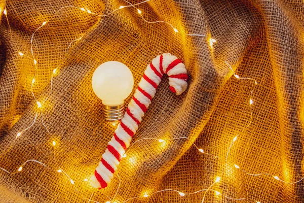Juta Háttere Karácsonyi Fények Ezen Környéken Izzó Cukorkát Kúp — Stock Fotó