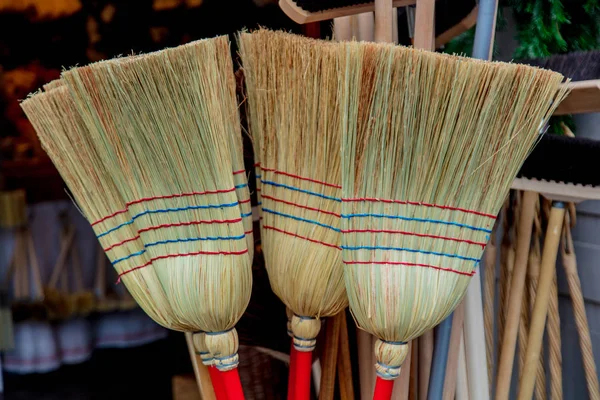 New brooms on street market — Stock Photo, Image