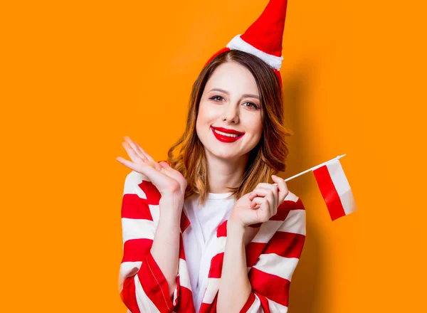 Cappello donna in Babbo Natale con bandiera polacca — Foto Stock