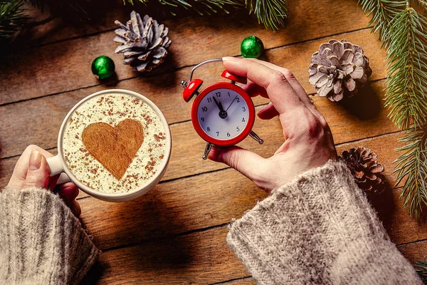 Christmas classic alarm clock and cup of cappuccino — Stock Photo, Image