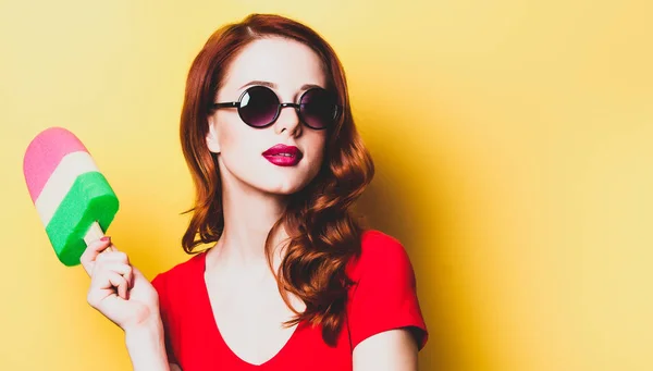 Portrait of redhead woman with ice-cream toy — Stock Photo, Image