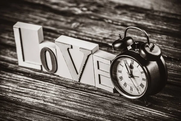 Alarm Clock Word Love Wooden Table Image Black White Color — Stock Photo, Image