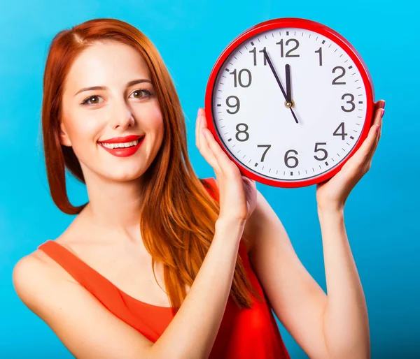 Redhead Girl Huge Clock Blue Background — Stock Photo, Image