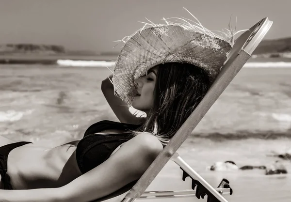 Girl lying down on lounger on Balos beach — Stock Photo, Image