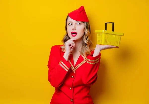 Portrait Charming Vintage Stewardess Wearing Red Uniform Shopping Basket Isolated — Stock Photo, Image