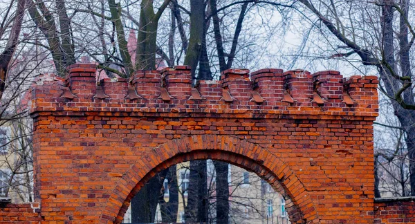 Old brick arch gates in a medieval church — Stock Photo, Image
