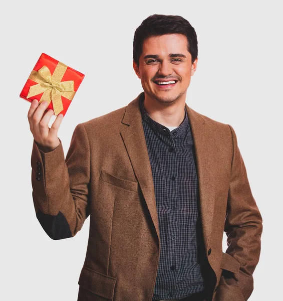 A man holding present box on white background. — Stock Photo, Image