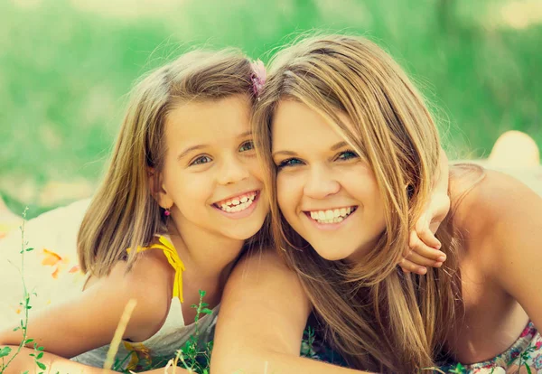 Two sisters in the park. — Stock Photo, Image