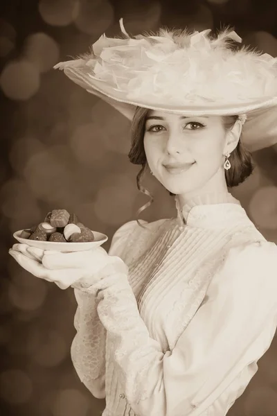 Mulheres ruivas bonitas com doces . — Fotografia de Stock