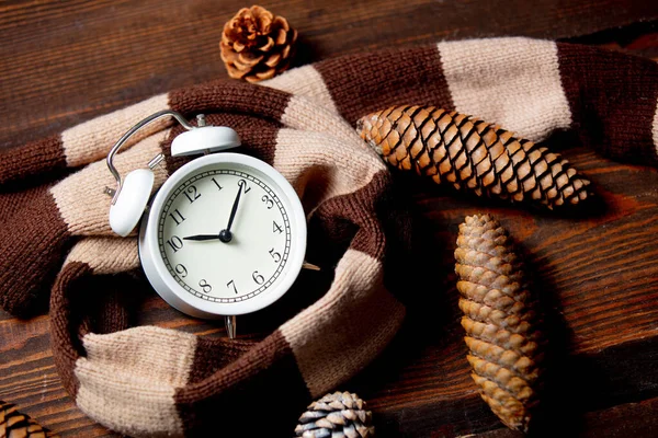 Scarf Alarm Clock Pine Cones Wooden Table — Stock Photo, Image