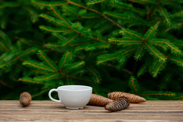 Cup Coffee Pine Cones Wooden Table Spruce Branches Background — Stock Photo, Image