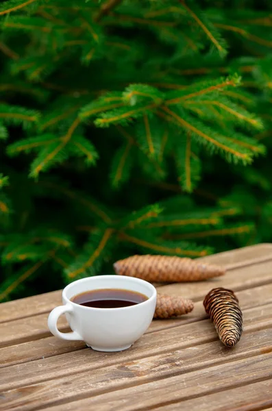 Cup Coffee Pine Cones Wooden Table Spruce Branches Background — Stock Photo, Image