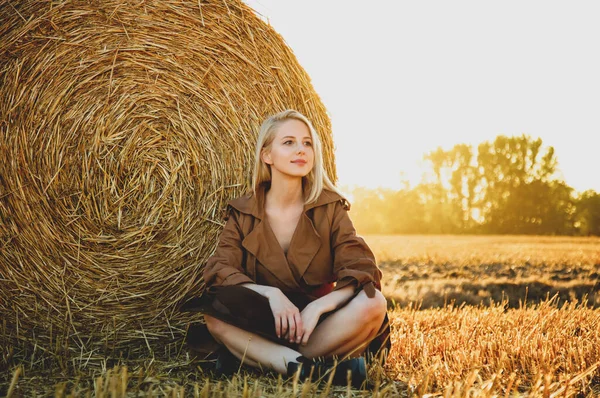 Blonde Girl Sitting Rolled Haystack Field Sunset Time — Stock Photo, Image