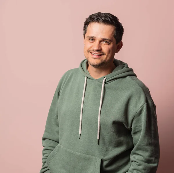 White Guy Green Hoodie Pink Background — Stock Photo, Image