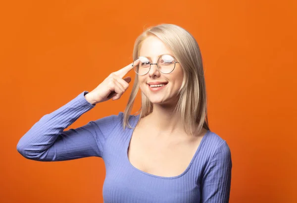 Cute Blonde Blue Blouse Glasses Exuberant Orange Color Background — ストック写真
