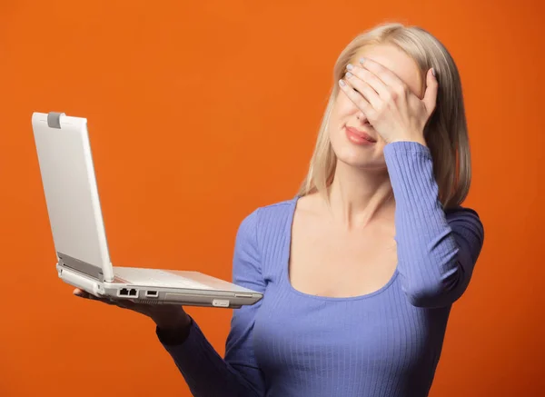 Cute Blonde Blue Blouse Laptop Computer Exuberant Orange Color Background — Stock Photo, Image