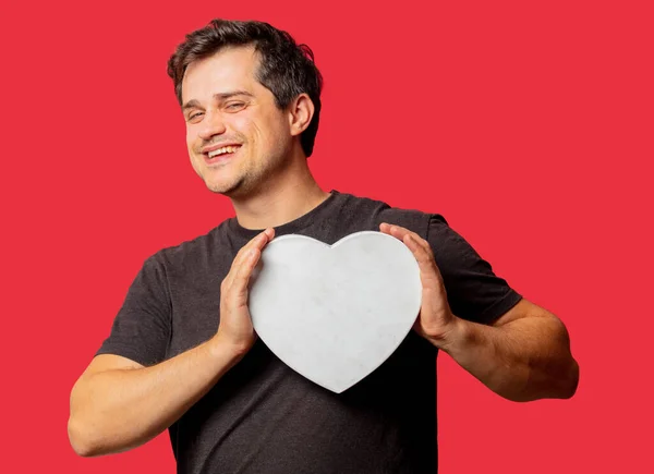 Brunette Guy Heart Shape Red Background — Stock Photo, Image