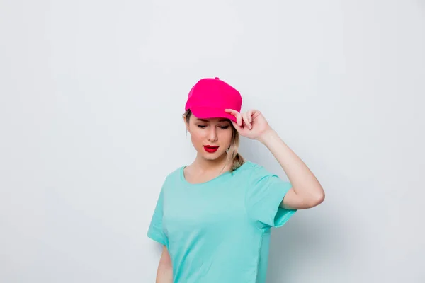 Beautiful Young Girl In Pink Cap And Blue T Shirt On White Background Fresh One Stock Photo Beautiful Young Girl In Pink Cap And Blue T Shirt On White Background Fresh One Stock Photo