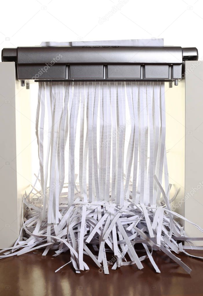 document shredded in paper shredder.