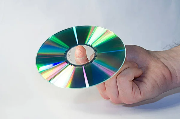 Zilveren Disk Mannelijke Hand Witte Achtergrond — Stockfoto