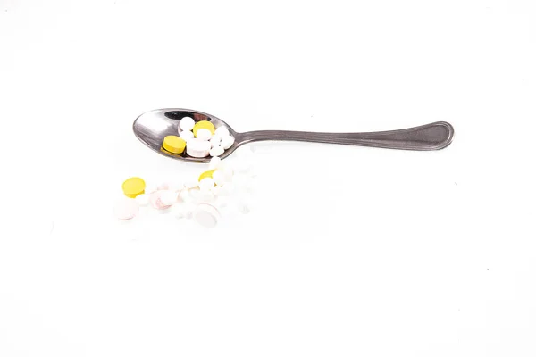 Kleiner Silberner Löffel Mit Medikamenten Auf Weißem Isoliertem Hintergrund — Stockfoto