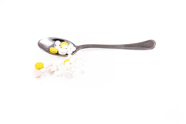 Kleiner Silberner Löffel Mit Medikamenten Auf Weißem Isoliertem Hintergrund — Stockfoto