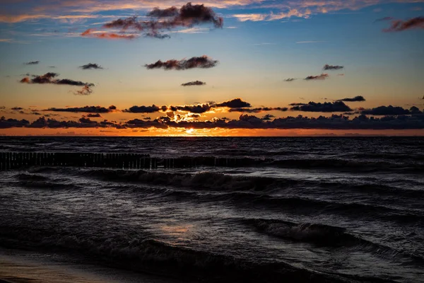 Beautiful Colorful Sunset Polish Baltic Sea Dark Sky Clouds Breakwater — Stock Photo, Image