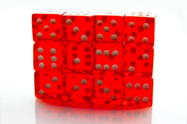 Array Red Transparent Dice Standing White Reflective Background — Stock Photo, Image