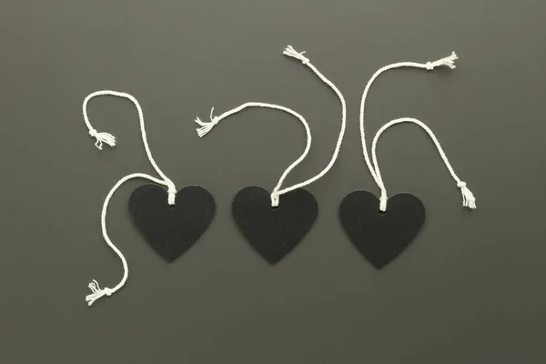 Top View Patterns Black Heart Shaped Label Cord — Stock Photo, Image